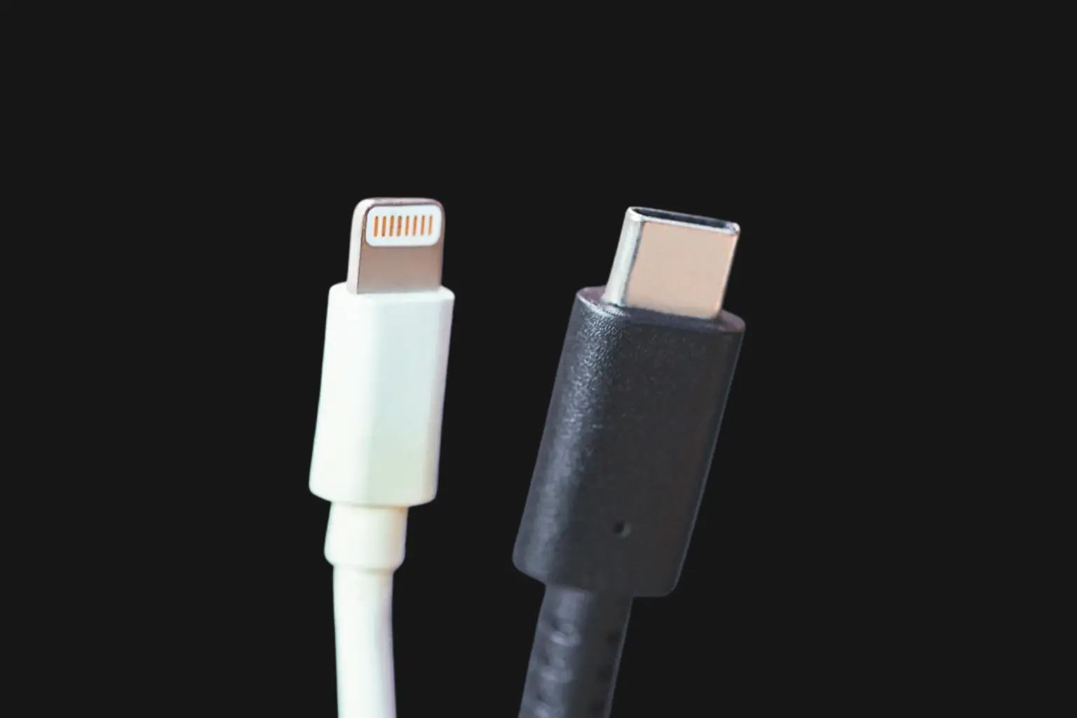 iPhone Lightning connector next to USB-C charging cable comparison
